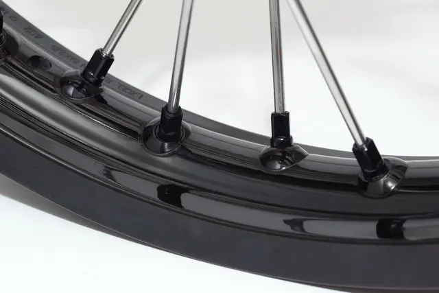 Haan Framhjul 17x3,50 - KTM/HQ - 22mm Sort Ring/Eiker/Nippler, Oransje Nav 